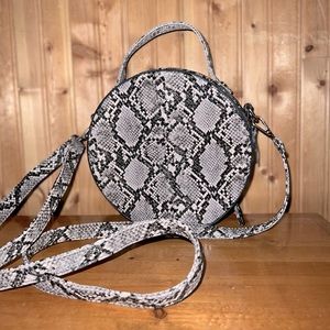 Circle snake skin crossbody bag